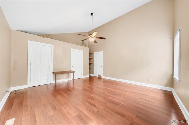 12353 Planck Rd, Perrysburg, NY 14129 - empty room featuring ceiling fan, high vaulted ceiling, light wood-style flooring, and baseboards