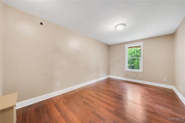 12353 Planck Rd, Perrysburg, NY 14129 - spare room featuring wood finished floors and baseboards