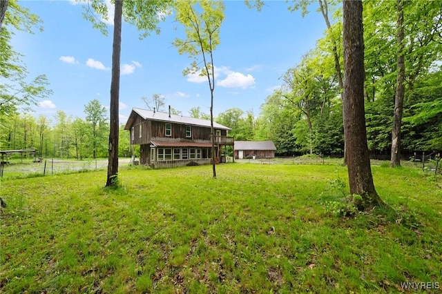 12353 Planck Rd, Perrysburg, NY 14129 - view of green lawn with a deck