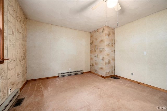4064 Kayuta Ter, Forestport, NY 13438 - carpeted spare room with a baseboard radiator, a baseboard heating unit, a ceiling fan, and baseboards