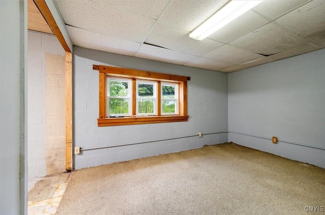 4064 Kayuta Ter, Forestport, NY 13438 - unfurnished room featuring concrete block wall and a paneled ceiling