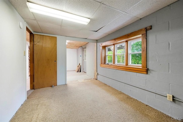 4064 Kayuta Ter, Forestport, NY 13438 - unfurnished room with a paneled ceiling and concrete block wall