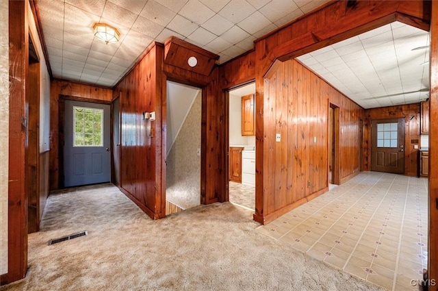 4064 Kayuta Ter, Forestport, NY 13438 - entryway with wood walls and light carpet