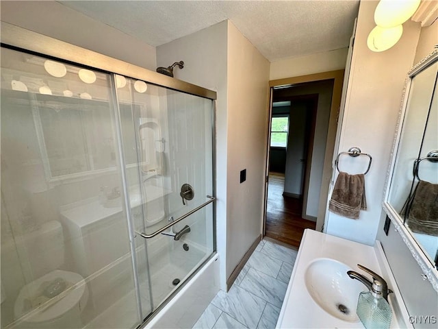 6302 Meadow Dr, Lee, NY 13440 - bathroom with marble look tile flooring, enclosed tub / shower combo, vanity, baseboards, and a textured ceiling