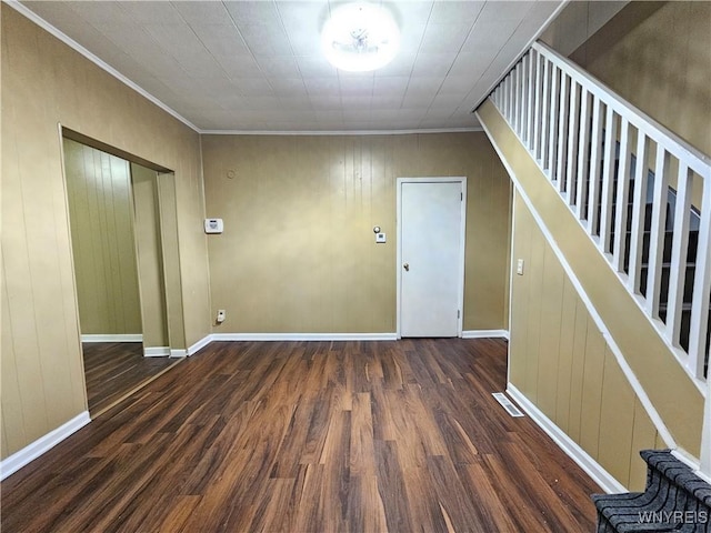 2207 Linwood Ave, Niagara Falls, NY 14305 - unfurnished room featuring wood finished floors, crown molding, baseboards, and stairs