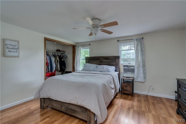 163 Maple St, Le Ray, NY 13612 - bedroom featuring multiple windows, baseboards, and a closet