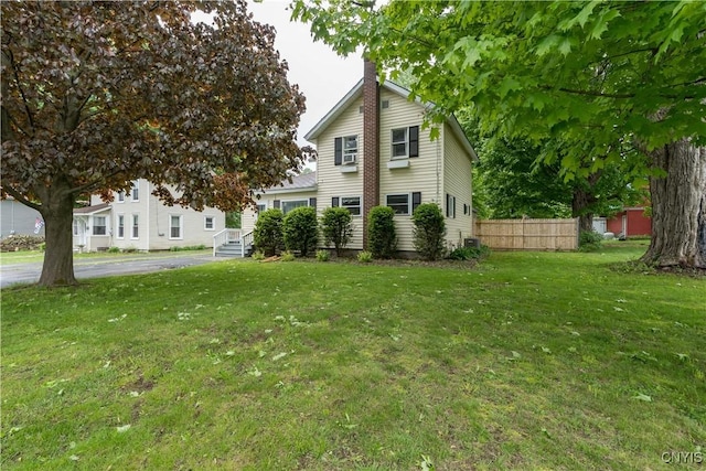 163 Maple St, Le Ray, NY 13612 - view of front of house featuring a chimney