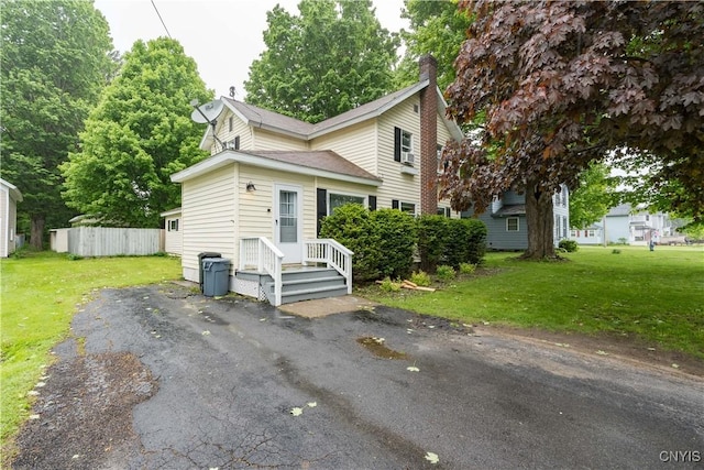 163 Maple St, Le Ray, NY 13612 - view of front of property with a chimney