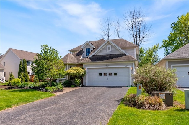 763 Bel Arbor Trl, Webster, NY 14580 - traditional-style home with driveway, an attached garage, a shingled roof, and a front yard