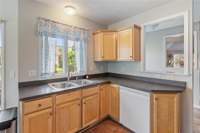 763 Bel Arbor Trl, Webster, NY 14580 - kitchen with white dishwasher, a sink, plenty of natural light, dark countertops, and a textured ceiling