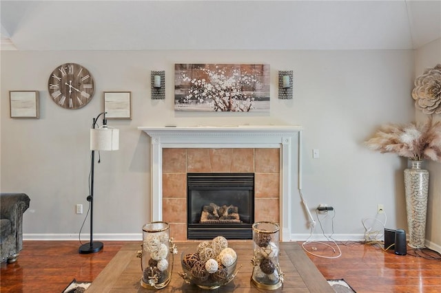 763 Bel Arbor Trl, Webster, NY 14580 - detailed view of wood finished floors, a tile fireplace, and baseboards