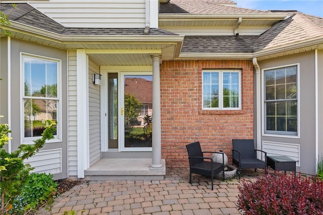 763 Bel Arbor Trl, Webster, NY 14580 - doorway to property with a shingled roof and brick siding