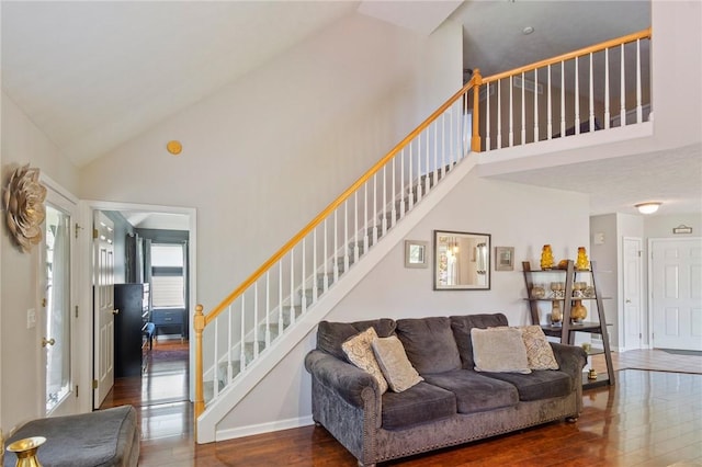 763 Bel Arbor Trl, Webster, NY 14580 - living area featuring high vaulted ceiling, wood-type flooring, and stairway