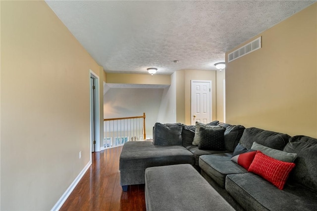 763 Bel Arbor Trl, Webster, NY 14580 - living area with dark wood-style floors, baseboards, and a textured ceiling