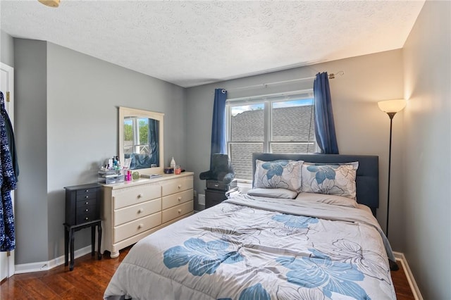 763 Bel Arbor Trl, Webster, NY 14580 - bedroom featuring dark wood-style flooring, a textured ceiling, and baseboards
