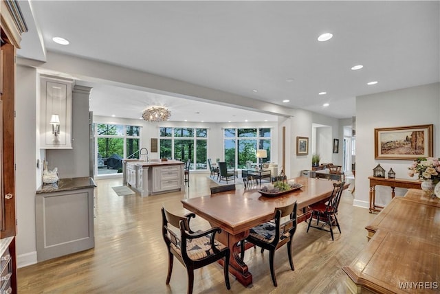 1225 W Arnold Dr, Hamburg, NY 14085 - dining space with light wood-type flooring, recessed lighting, and baseboards