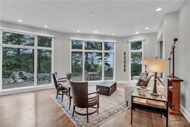 1225 W Arnold Dr, Hamburg, NY 14085 - living area with recessed lighting, wood finished floors, and baseboards