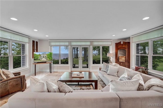 1225 W Arnold Dr, Hamburg, NY 14085 - living area featuring recessed lighting, plenty of natural light, and french doors