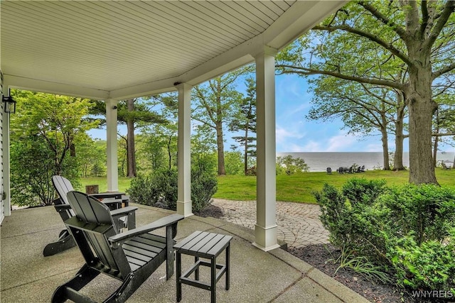 1225 W Arnold Dr, Hamburg, NY 14085 - view of patio with a water view and outdoor dining area