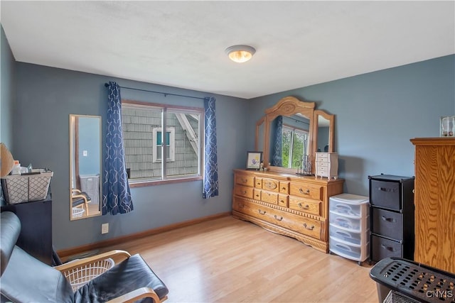 229 Brookfield Rd, Salina, NY 13211 - living area featuring wood finished floors and baseboards