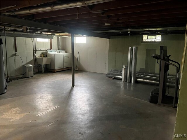 105 Woodland Dr, Cicero, NY 13212 - basement featuring washing machine and clothes dryer and a sink