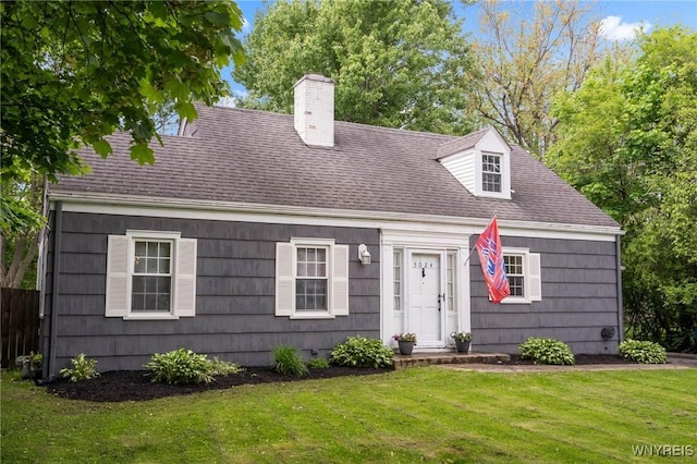 5024 Callan Dr, Lewiston, NY 14092 - cape cod-style house with a chimney, a front lawn, and roof with shingles