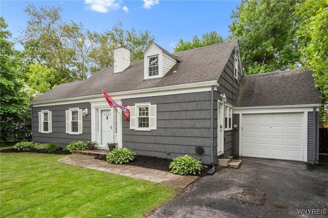 5024 Callan Dr, Lewiston, NY 14092 - new england style home featuring a chimney, a garage, a front lawn, asphalt driveway, and a shingled roof