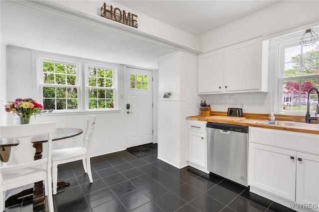 5024 Callan Dr, Lewiston, NY 14092 - kitchen with stainless steel dishwasher, a sink, and plenty of natural light