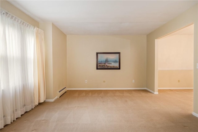 61 Brookside Cir, Big Flats, NY 14903 - unfurnished room featuring light carpet, baseboards, and a baseboard radiator