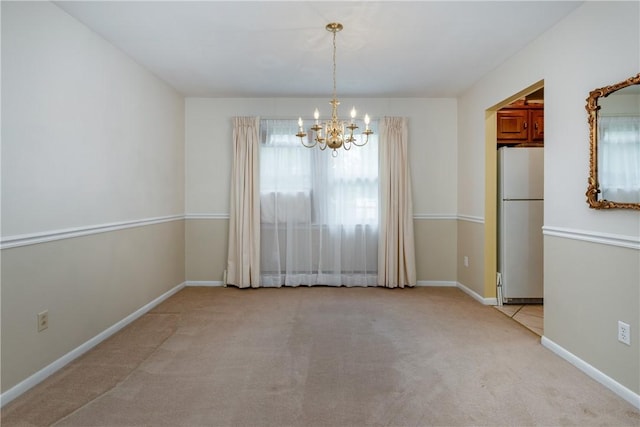 61 Brookside Cir, Big Flats, NY 14903 - unfurnished dining area featuring a chandelier, light colored carpet, and baseboards