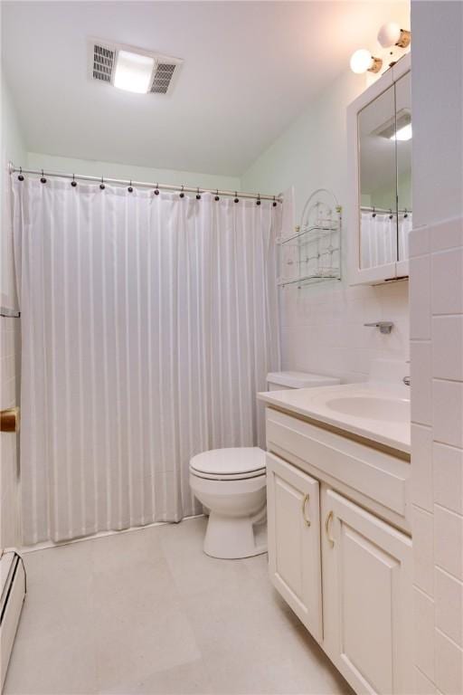 61 Brookside Cir, Big Flats, NY 14903 - bathroom featuring baseboard heating, vanity, toilet, and a shower with shower curtain