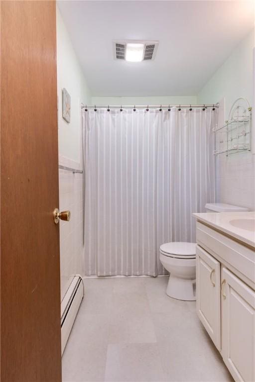 61 Brookside Cir, Big Flats, NY 14903 - bathroom with a baseboard radiator, toilet, vanity, a shower with curtain, and tile walls