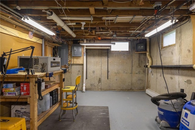 61 Brookside Cir, Big Flats, NY 14903 - below grade area featuring electric panel and a workshop area