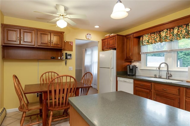 61 Brookside Cir, Big Flats, NY 14903 - kitchen featuring white appliances, a sink, brown cabinets, dark countertops, and recessed lighting