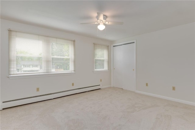 61 Brookside Cir, Big Flats, NY 14903 - carpeted empty room with a baseboard heating unit, a ceiling fan, and baseboards