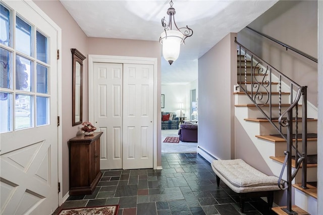 126 True Hickory Dr, Greece, NY 14615 - entryway with stone tile floors, baseboard heating, plenty of natural light, and baseboards