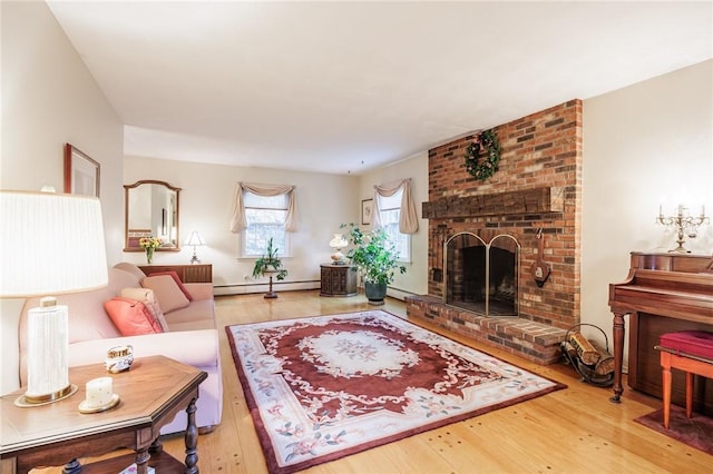 126 True Hickory Dr, Greece, NY 14615 - living area featuring wood finished floors, a brick fireplace, and baseboard heating