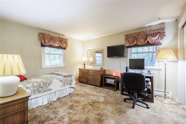 126 True Hickory Dr, Greece, NY 14615 - carpeted bedroom featuring an office area and a baseboard radiator
