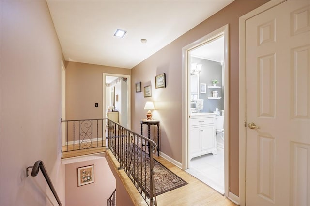 126 True Hickory Dr, Greece, NY 14615 - staircase with wood finished floors and baseboards