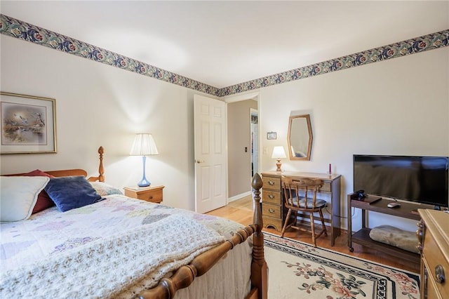 126 True Hickory Dr, Greece, NY 14615 - bedroom with light wood-style flooring and baseboards