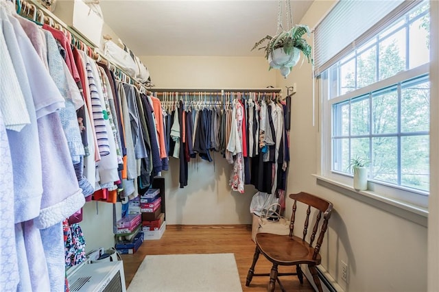 126 True Hickory Dr, Greece, NY 14615 - spacious closet featuring wood finished floors