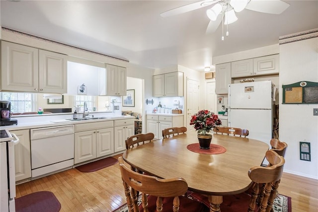 126 True Hickory Dr, Greece, NY 14615 - dining room featuring light wood finished floors and ceiling fan