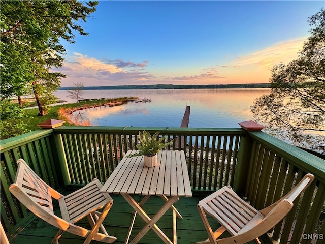 97 Burtis Point Rd, Owasco, NY 13021 - balcony at dusk featuring a water view
