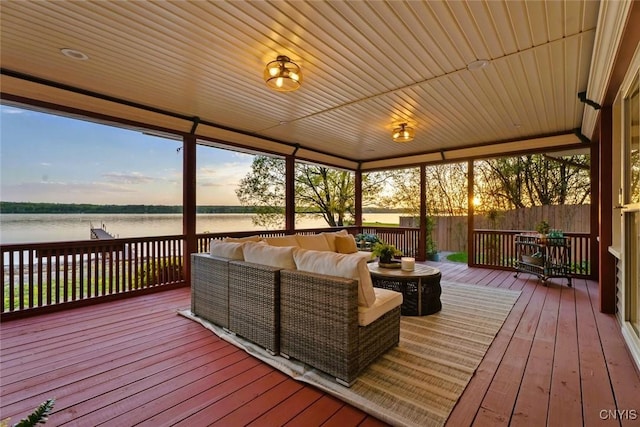 97 Burtis Point Rd, Owasco, NY 13021 - sunroom / solarium featuring an outdoor hangout area and a water view