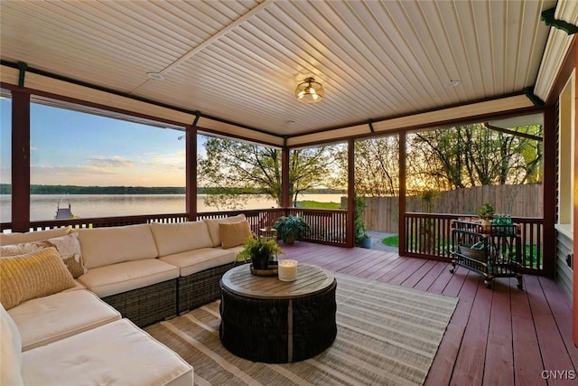 97 Burtis Point Rd, Owasco, NY 13021 - sunroom with outdoor lounge area, a water view, and healthy amount of natural light