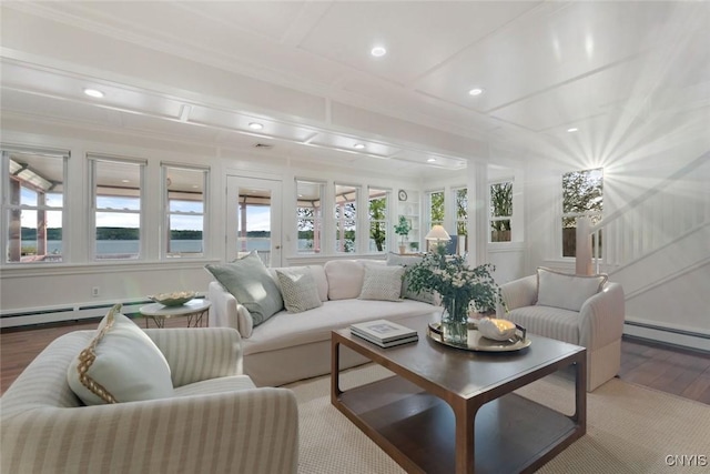97 Burtis Point Rd, Owasco, NY 13021 - living area with a baseboard radiator, wood finished floors, recessed lighting, and ornamental molding