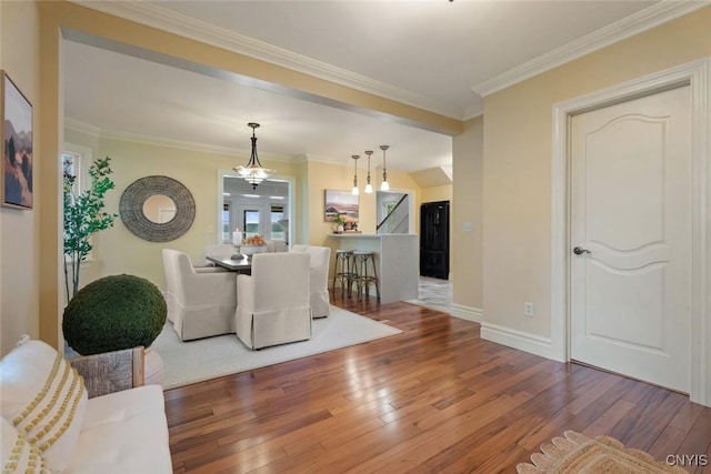 97 Burtis Point Rd, Owasco, NY 13021 - living area featuring wood-type flooring, baseboards, and ornamental molding