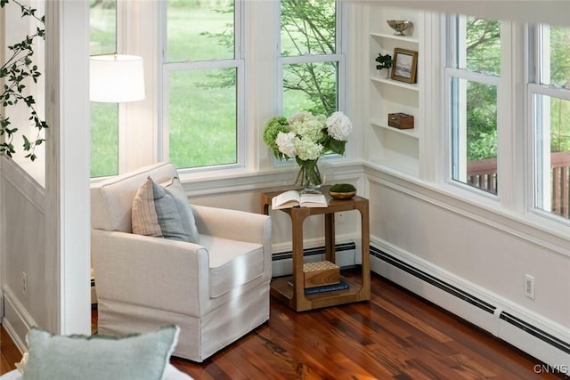 97 Burtis Point Rd, Owasco, NY 13021 - sunroom / solarium with healthy amount of natural light and a baseboard heating unit