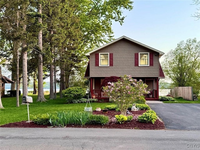 97 Burtis Point Rd, Owasco, NY 13021 - view of front facade featuring asphalt driveway