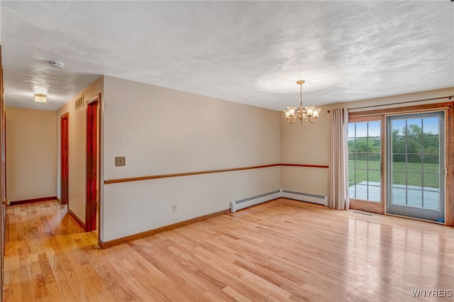7415 Colonial Dr, Niagara, NY 14305 - unfurnished room with light wood-style floors, a chandelier, a baseboard radiator, and baseboards